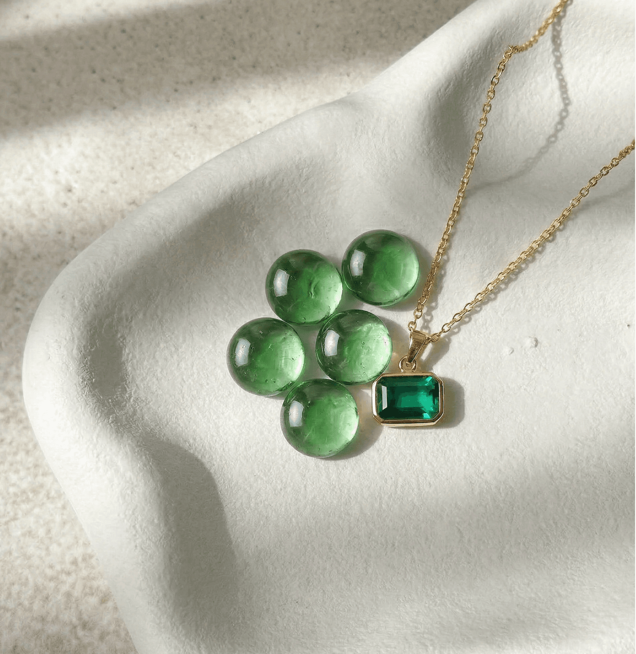 Selah Stones set into a gold necklace